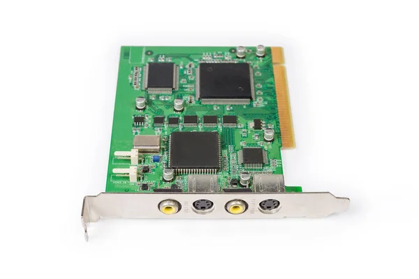 Old internal analog video capture card for PCI bus used in desktop computers on a white background, view from the side of the bracket with external connectors close-up in selective focus
