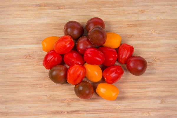 Pile Fresh Ripe Multicolored Cherry Tomatoes Wooden Cutting Board Top — Stock Photo, Image