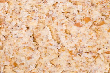 Düz diyet çavdar ekmeğinin dokusu, üst kısmı yakın plan, arka plan.