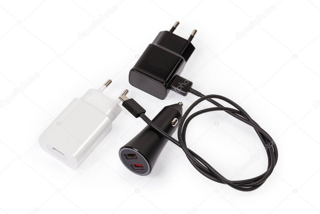 USB chargers of electronic portable devices with AC Europlugs and connected appropriate cable, USB car charger pluggable to car power outlet, on a white background