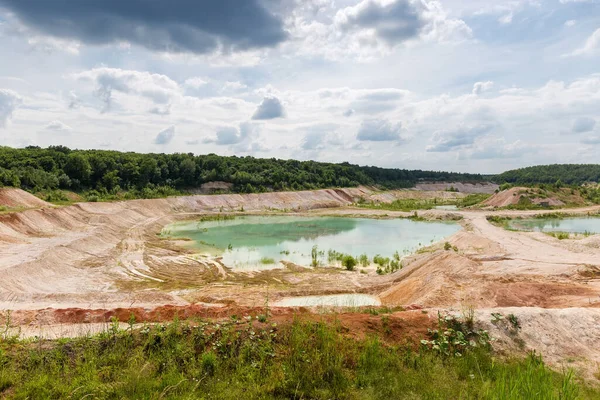 Abandoned China Clay Quarry Partly Filled Water Surrounded Forest Cloudy — стоковое фото
