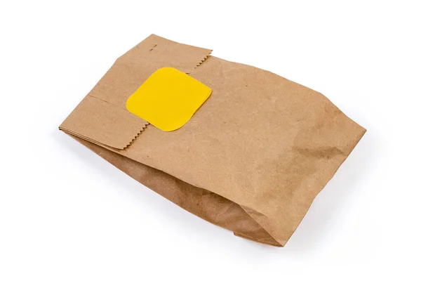 Closed Small Packing Bag Made Kraft Paper Sealed Yellow Sticker — Stock Photo, Image