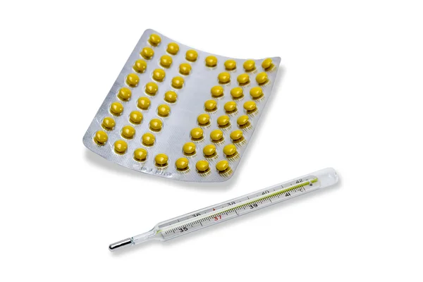 Thermometer en verpakking van geneesmiddelen — Stockfoto