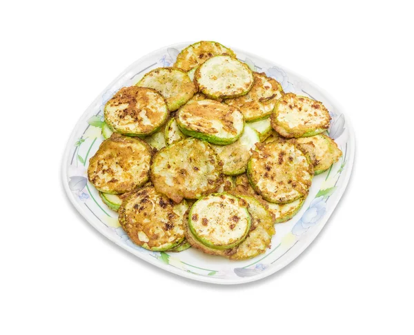 Zucchine, fritte in pastella su piatto su fondo chiaro — Foto Stock
