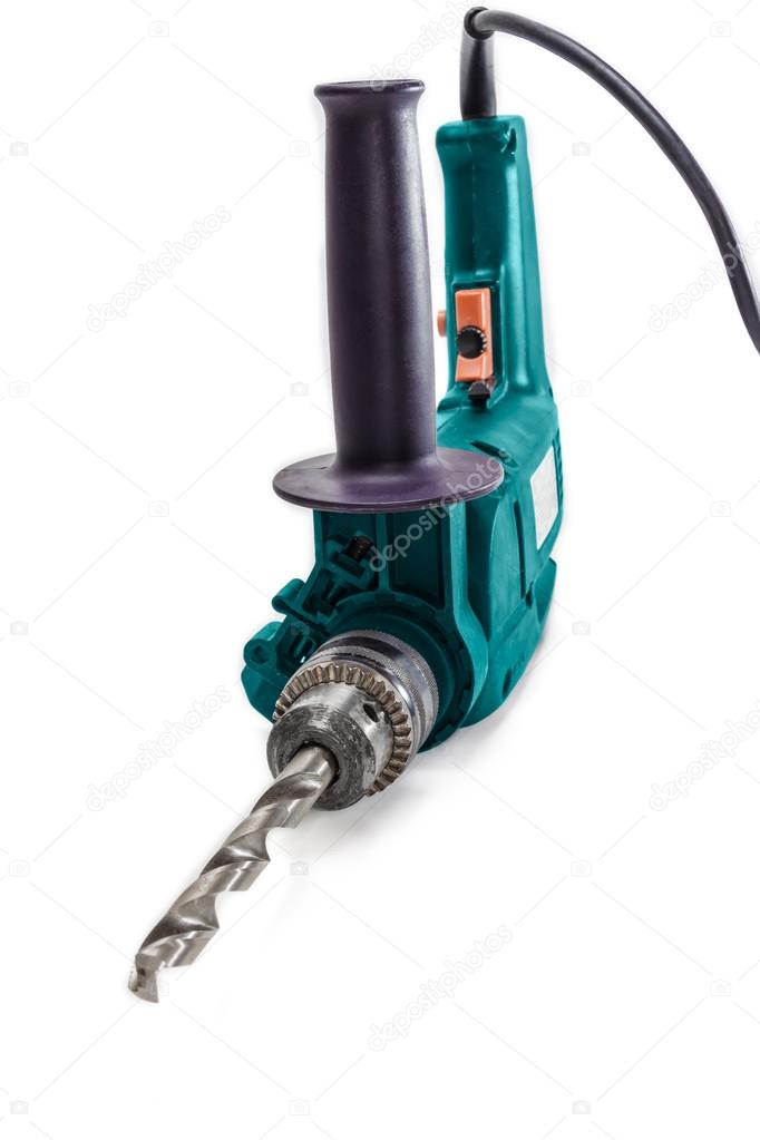 Electric drill on a light background closeup