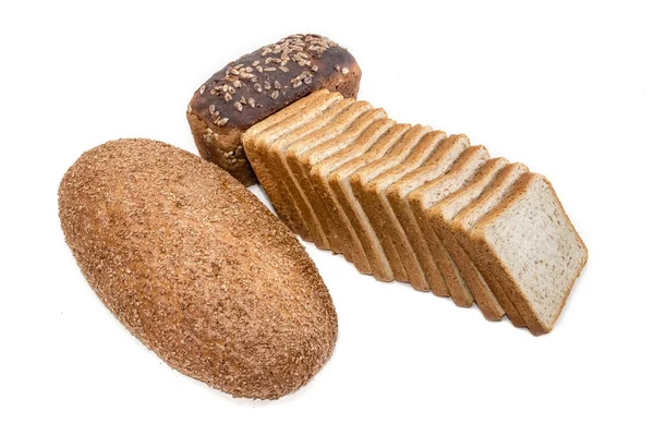 Pan diferente con salvado sobre un fondo claro —  Fotos de Stock