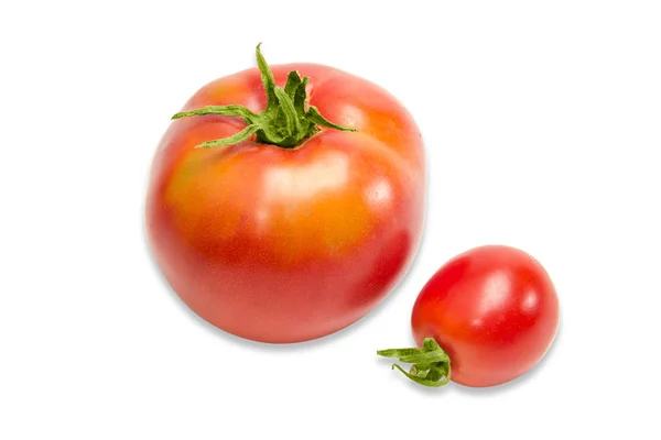 Two ripe red tomatoes different sizes closeup — Stock Photo, Image