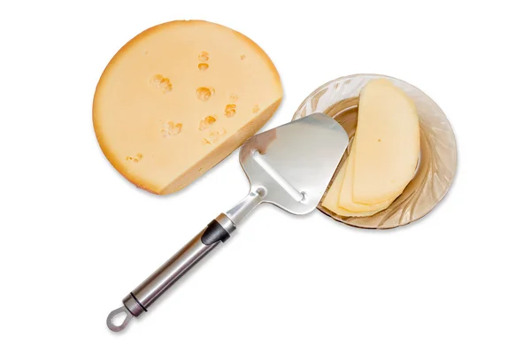 Morceau de fromage, tranches de fromage et trancheuse de fromage — Photo