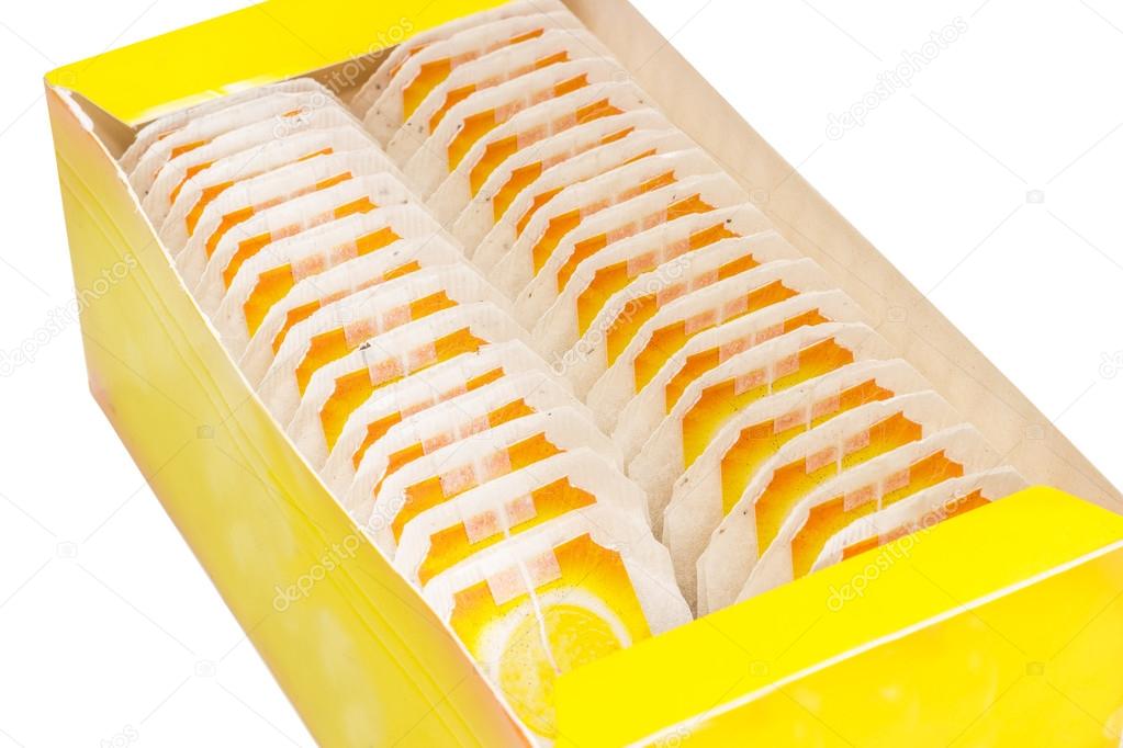 Yellow pasteboard box of tea bags
