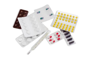 Clinical thermometer and several packaging of medications