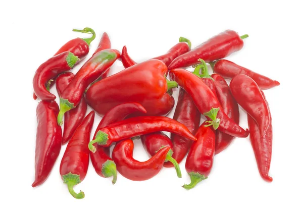Bell pepper among a pile of chili — Stockfoto
