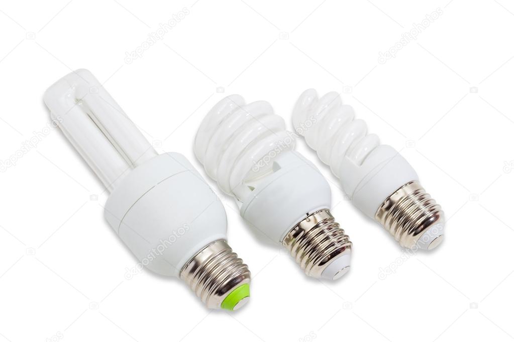 Three compact fluorescent lamp on a light background