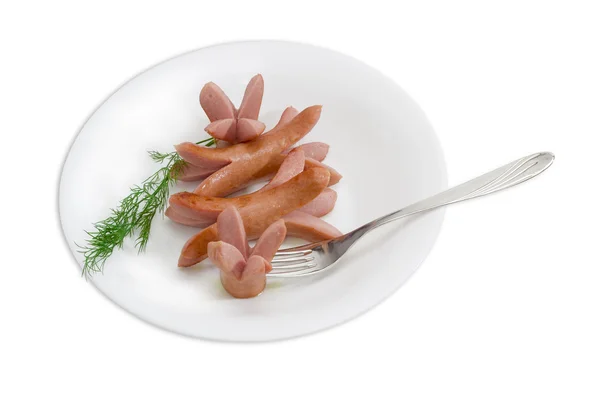 Grilled frankfurters, branch of dill and a fork — Stock Photo, Image