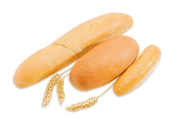 Various bakery products and three spikes on a light background — Φωτογραφία Αρχείου