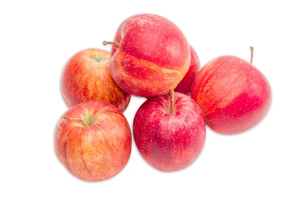 Haufen roter Äpfel auf hellem Hintergrund — Stockfoto