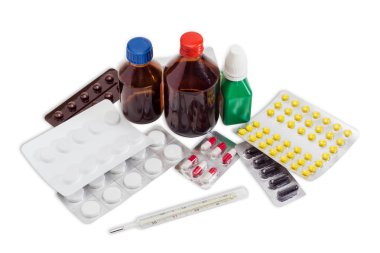 Clinical thermometer and several bottles and blister pack of med