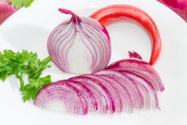 Chopped red onion, parsley and chili closeup