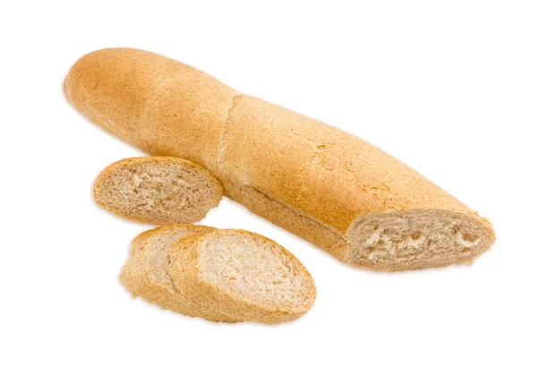 Long wheat bread with bran on a light background — Stock fotografie