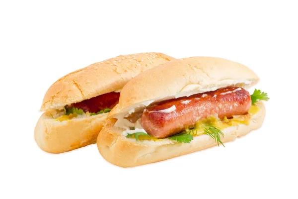 Due hot dog su uno sfondo leggero — Foto Stock
