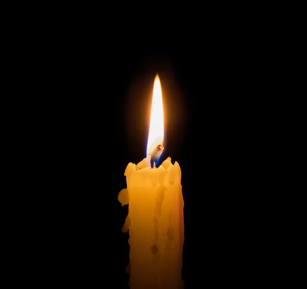 Candle on a dark background — Stock Photo, Image