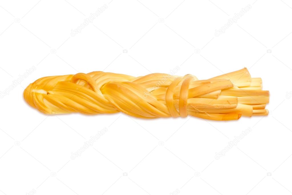 Braided chechil cheese on a light background