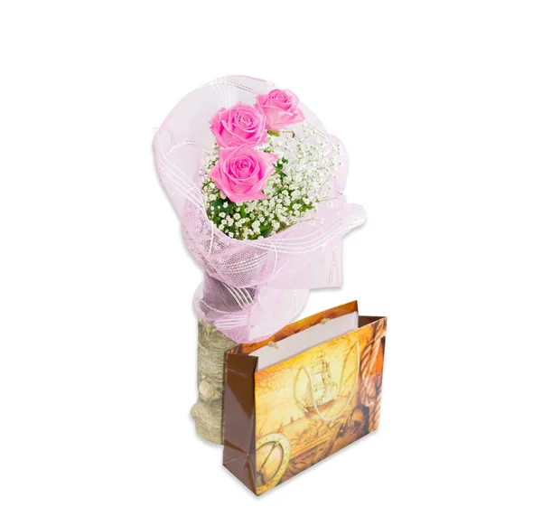 Bouquet of pink roses on a background of paper bag — Stock Photo, Image
