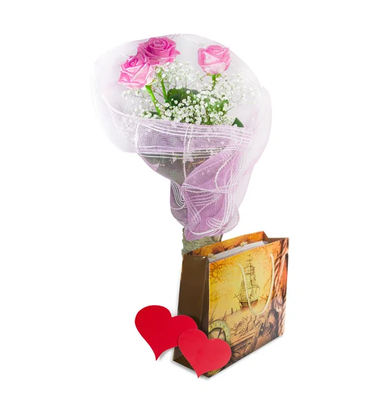 Roses, paper bag and hearts made of red paper — Stock Photo, Image