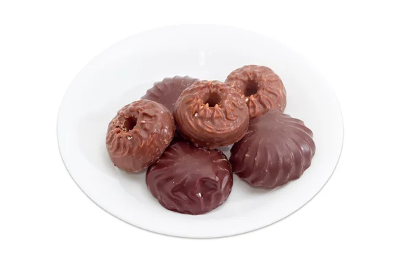 Zefir glasiert mit Schokolade auf einem weißen Teller — Stockfoto