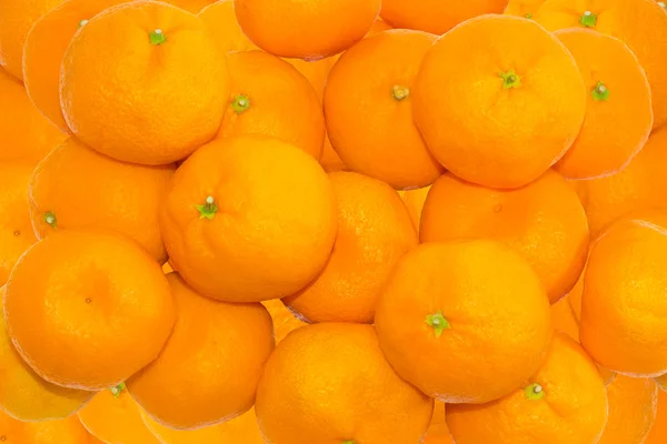 Antecedentes de una mandarina naranjas — Foto de Stock