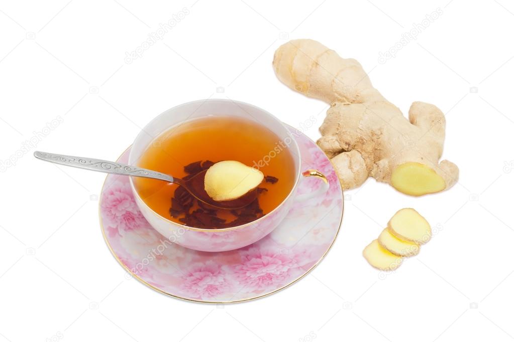 Ginger tea on a background of ginger root