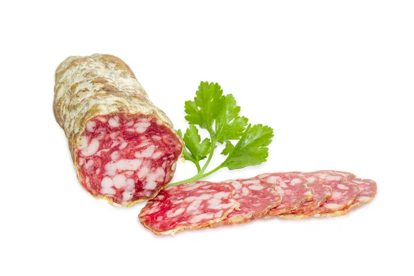 Salami and sprig of parsley on a light background — 图库照片