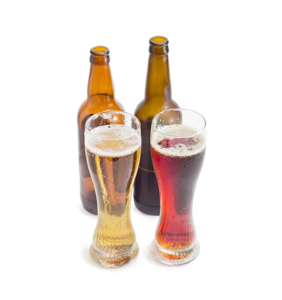 Two beer glasses and two bottles of various beer — Stock Photo, Image