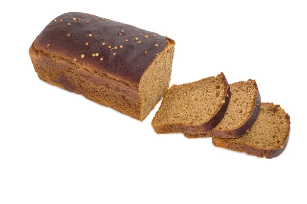 Brown bread sprinkled with coriander on a light background — Zdjęcie stockowe