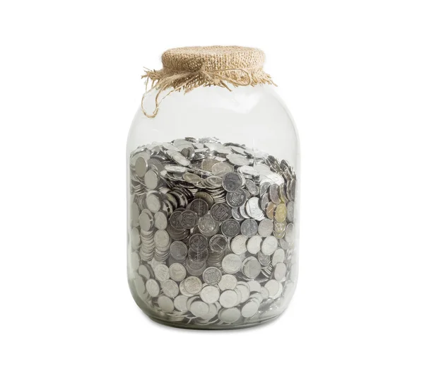 Coins in jar for home canning on a light background — Zdjęcie stockowe