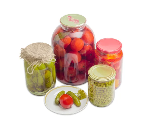 Pickled vegetables on saucer and in glass jars — Φωτογραφία Αρχείου