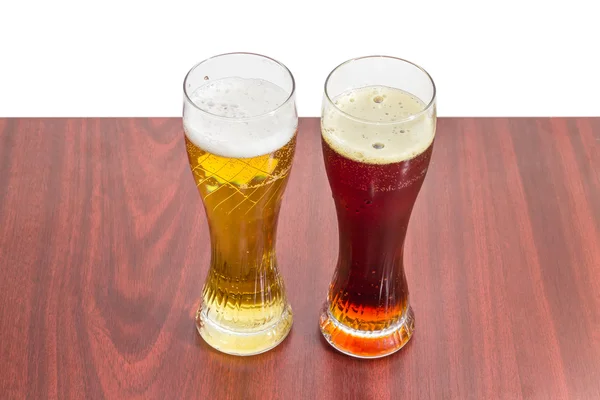 Two beer glasses with lager beer and dark beer — Stock Photo, Image