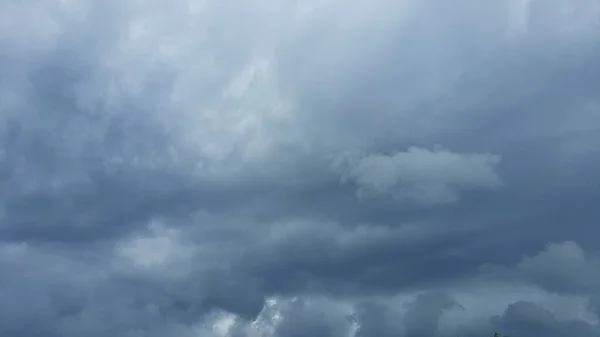 black clouds envelop the earth