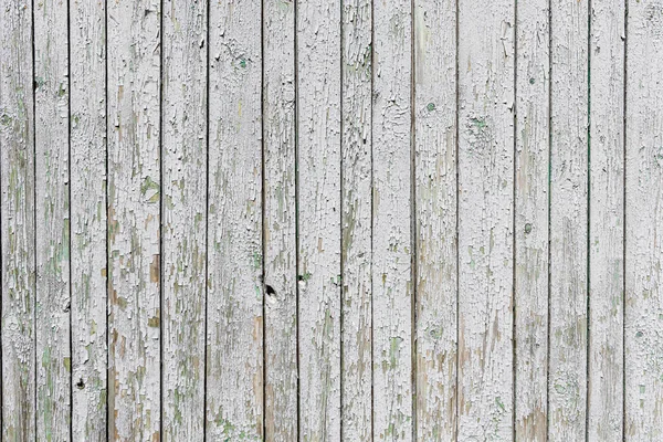 Een horizontale textuur van oude witte planken geschilderd met witte kleur met knopen en hars — Stockfoto