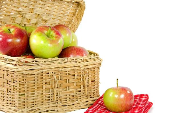 Apples with picnic basket — Stock Photo, Image