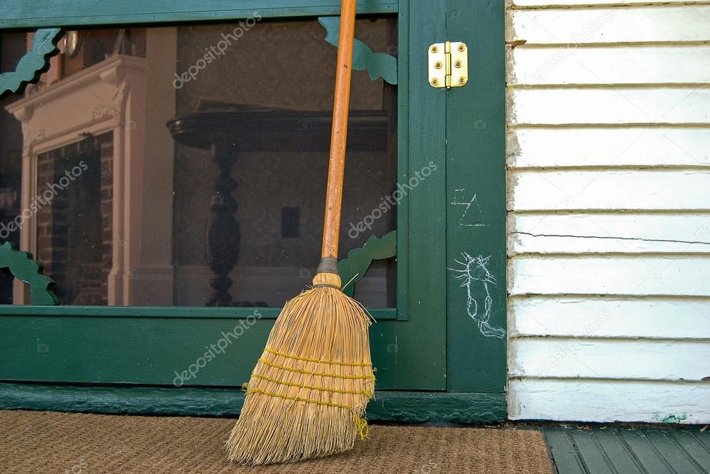 Old broom with hobo sign