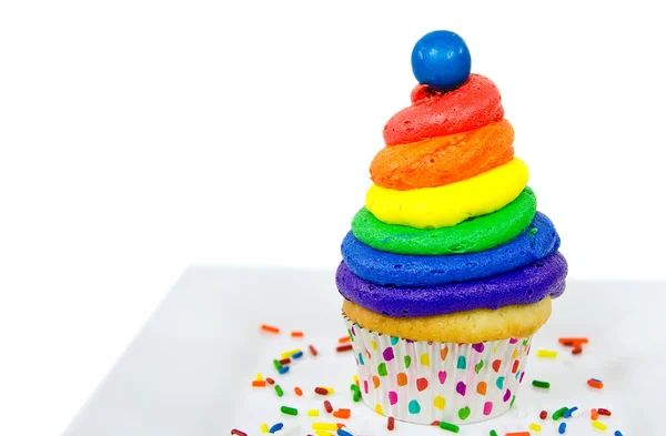 カップケーキの上の虹アイシング — ストック写真