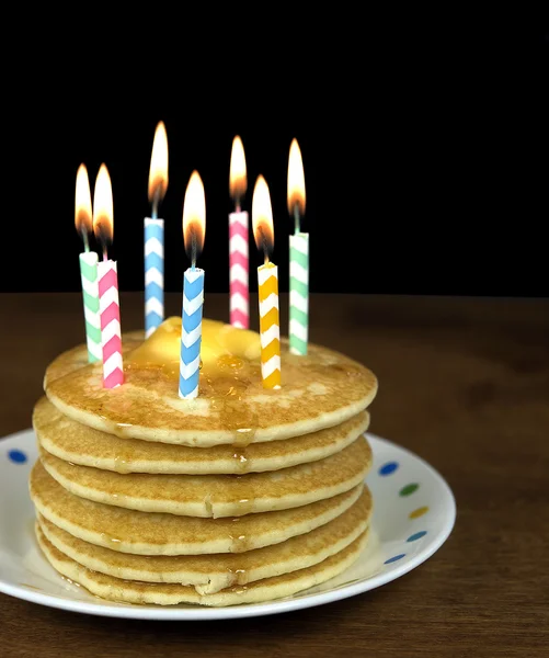 Birthday ljus på pannkakor — Stockfoto