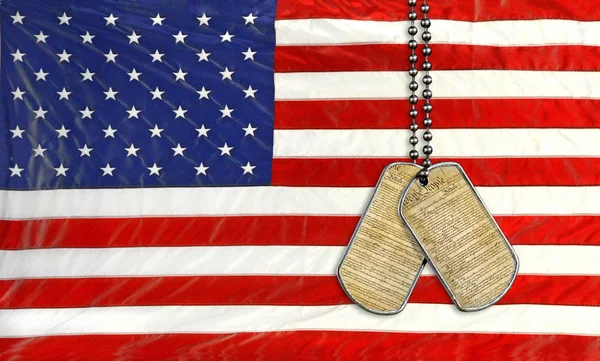 Dog tags on American flag — Stock Photo, Image