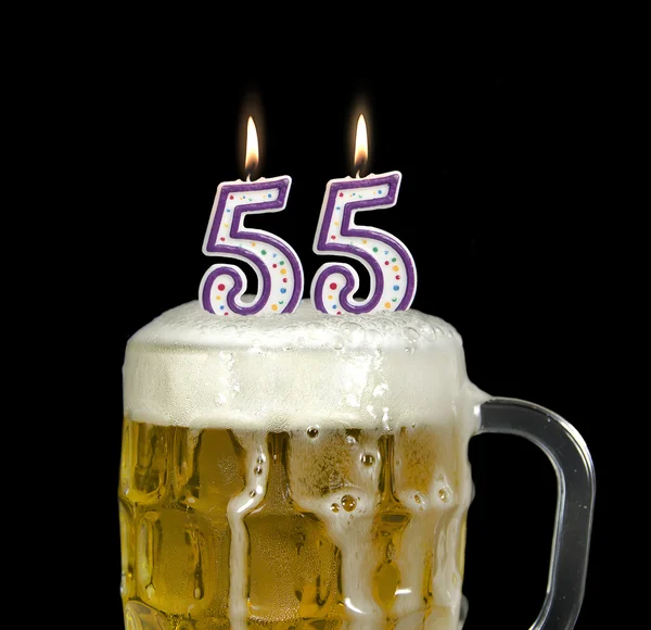 Birthday candles in beer mug — Stock Photo, Image