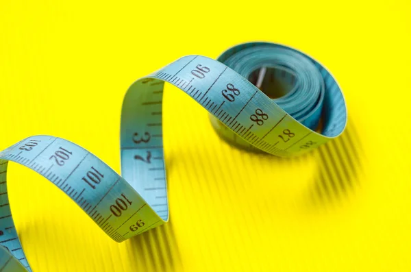 Twisted tape measure — Stock Photo, Image