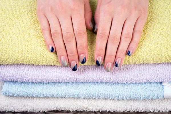 Hands on towels — Stock Photo, Image