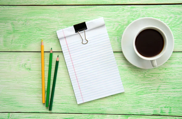 Σημειωματάριο και φλιτζάνι καφέ — Φωτογραφία Αρχείου