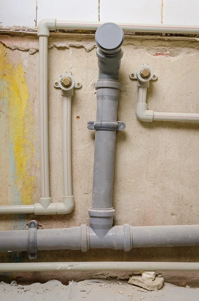 Mount pipe on wall — Stock Photo, Image