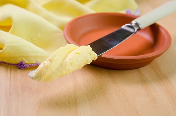 Mantequilla en el primer plano del cuchillo —  Fotos de Stock
