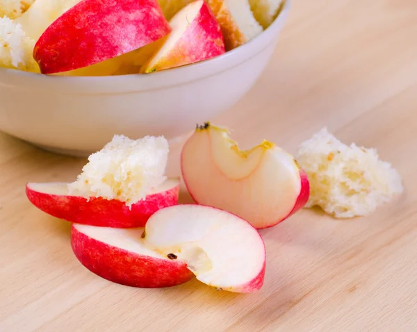 Sliced apple with crumbs — Stock Photo, Image